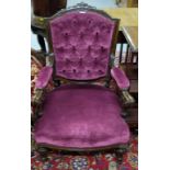 WMIV mahogany framed Armchair, the padded and button back over a sprung seat, covered with purple