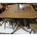 Mid 20thC mahogany extending Dining Table on twin pillar bases with castors (1 removable leaf), 42”w