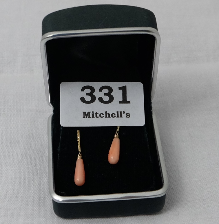 Matching Pair of Ladies Coral Drop Earrings, on gold plinths,