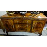 Walnut Sideboard, the raised moulded gallery over 3 inverted front drawers, bow-fronted sides, on