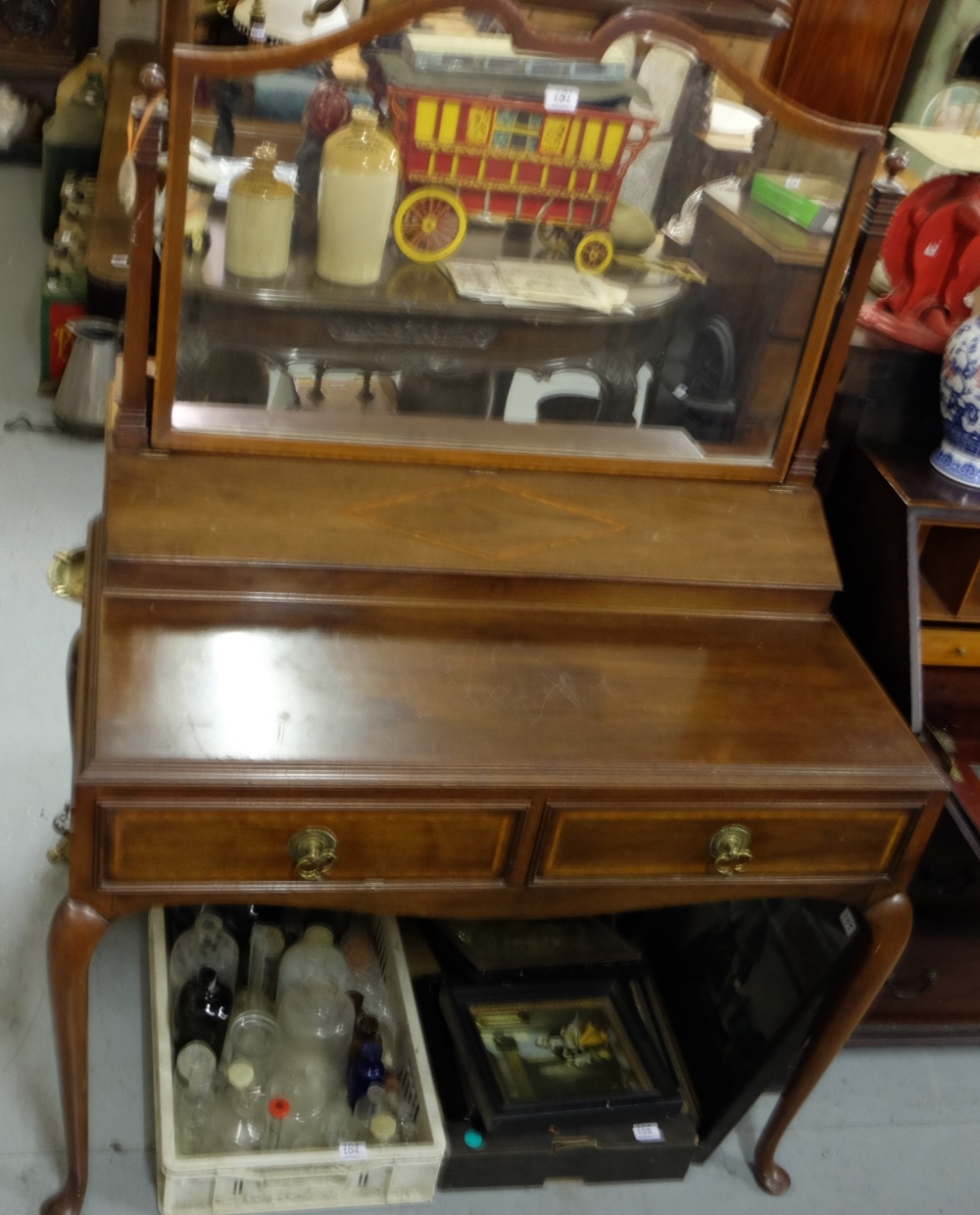 Edw. Inlaid Mahogany Dressing Table, the swivel mirror over a hinged brush compartment and 2 brass