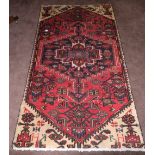 Hameden Floor Rug, red ground with central medallion, 165 x 95cm