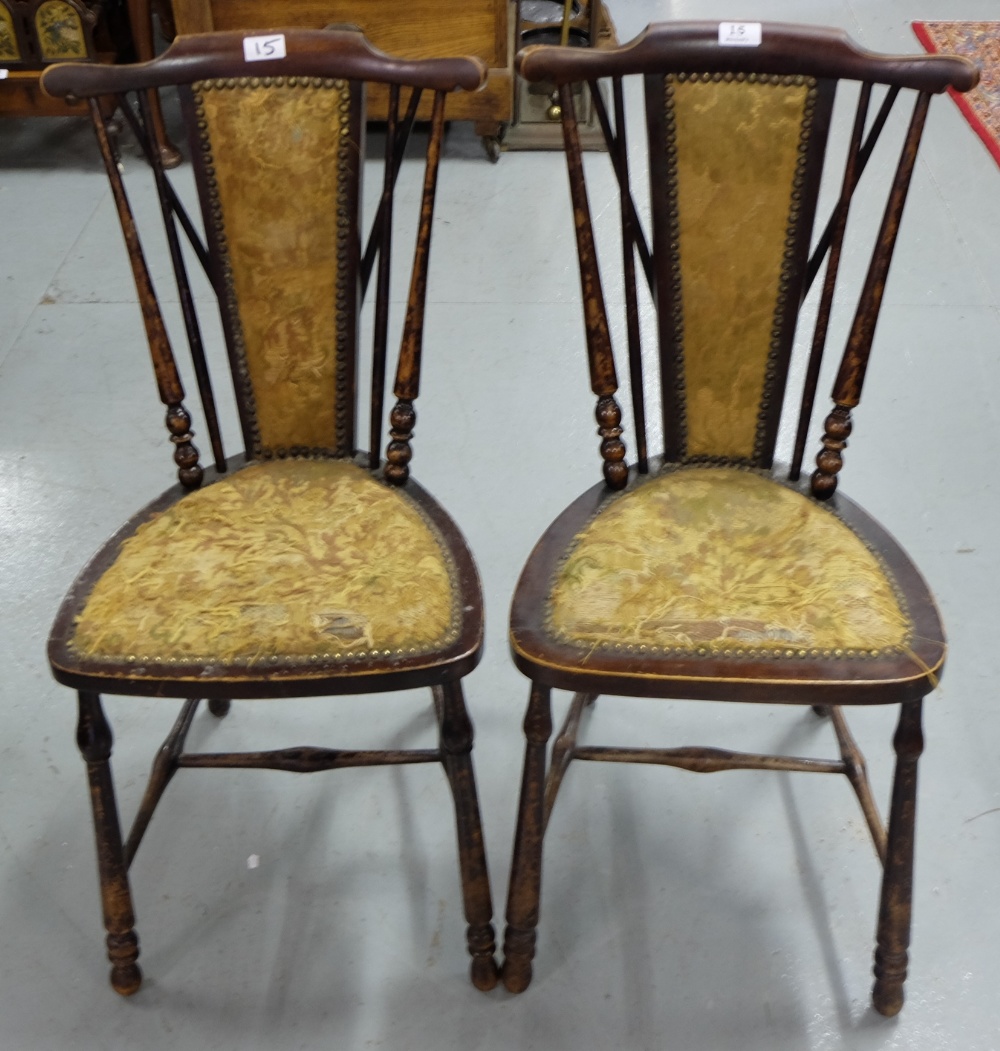 Matching Pair of walnut kitchen chairs, spindle backs and legs, shield shaped seats.