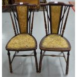 Matching Pair of walnut kitchen chairs, spindle backs and legs, shield shaped seats.