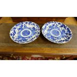 Matching Pair early 20thC Chinese plates, blue and white with continuous pattern of Chinese man in