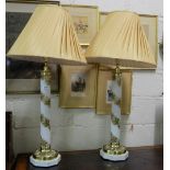Matching pair electric white opalene glass table lamps on brass bases, marble platforms with pair of