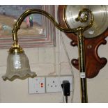 Matching Pair of electric Cast Brass Standard Lamps, with clear opalene glass shades, on 3 paw feet,