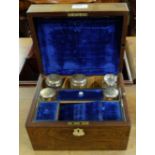 Edw. Rosewood Cased Travelling Cosmetic Box, the blue velvet lined interior fitted with perfume &