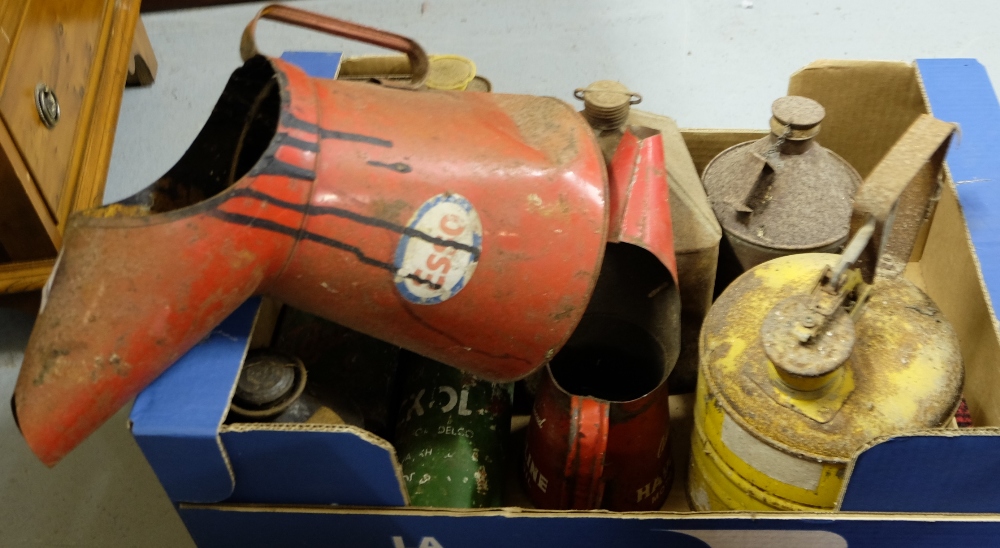 Group of old oil tins (10 approx)