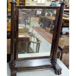 WMIV Mahogany framed Toilet Mirror, with original plate glass, supported on turned columns, scrolled