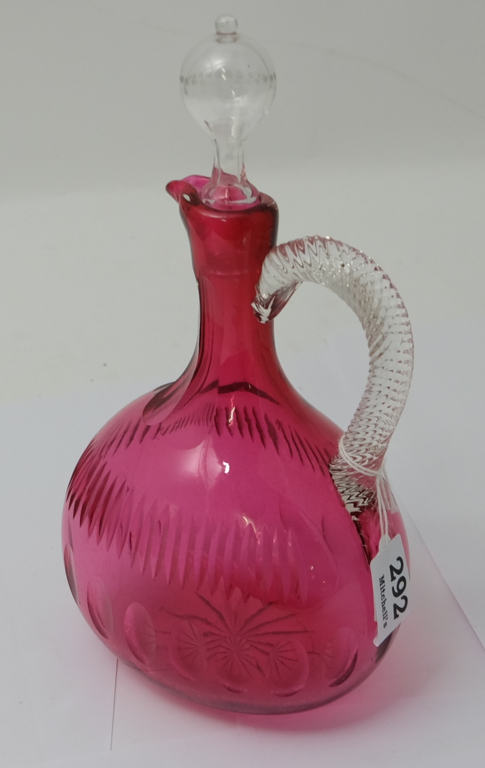 Victorian red glass Decanter with circular clear flame glass stopper, thumb pressed and ribbed