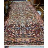 Persian Hamedan Floor Rug, deep red ground with floral décor, multiple borders, 40” x 112”