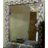 Rectangular marble mounted wall mirror, 43” x 36”.