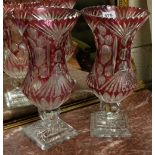 Matching Pair of Bohemian Belgian Red and Clear Glass Fluted Vases, on square plinths, 14”h