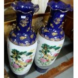 Matching Pair of Tall Porcelain Vases, each 43”h, decorated with Chinese cranes in natural floral