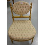 19thC French gilt Salon Chair, the pineapple finials over a floral covered padded back and seat,