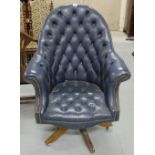 Swivel Office Chair, blue leather upholstery, button back.