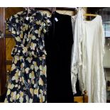 3 Lady’s Dresses – 1 floral silk, 1 black velvet, 1cream with crochet overlay, scarf and belt.