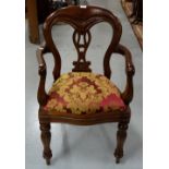 Mahogany Framed Carver Chair, red and gold floral covered padded seat, turned legs.