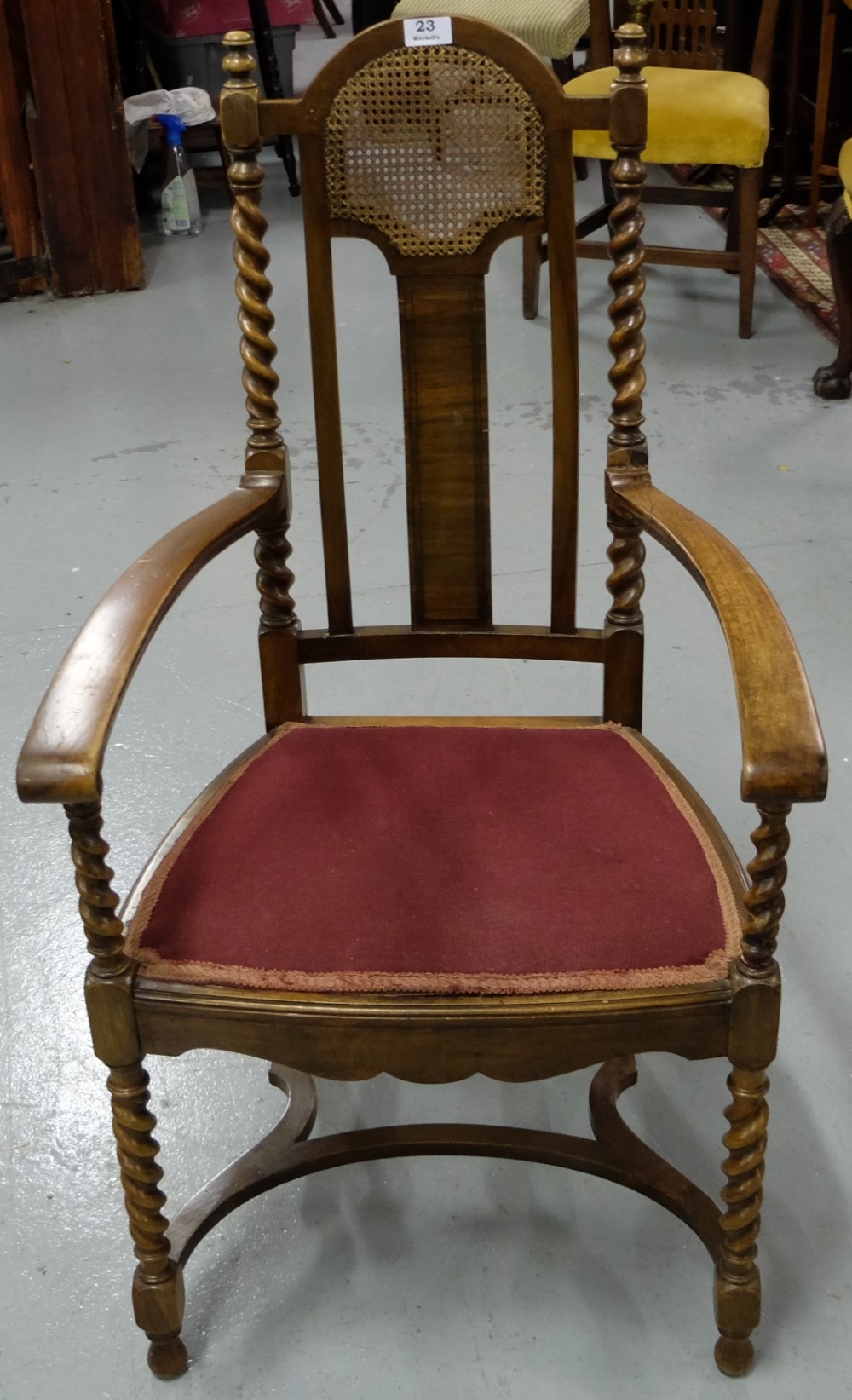 Mahogany framed Armchair with barley twist supports and legs, bergere insert, red padded sea.