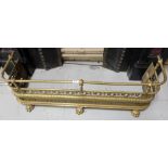 Victorian brass fender, the top rail over pierced front panel on 3 paw feet, 43”w x 13”h