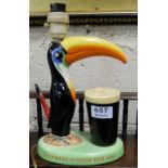 Arthur Guinness electric Table Lamp, in the form of a hand painted Toucon with a pint of Guinness,