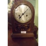 Edwardian inlaid oak mantle clock.
