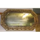 Brass bevel edged wall mirror.