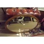 Edwardian inlaid mahogany oval mirror.