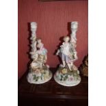 Pair of Meissen style candle sticks. {