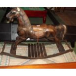 Carved painted pine child's rocking hors