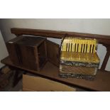 Cased Sewing Machine and an Accordion