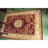 Wool rug with floral pattern.  {  172 cm