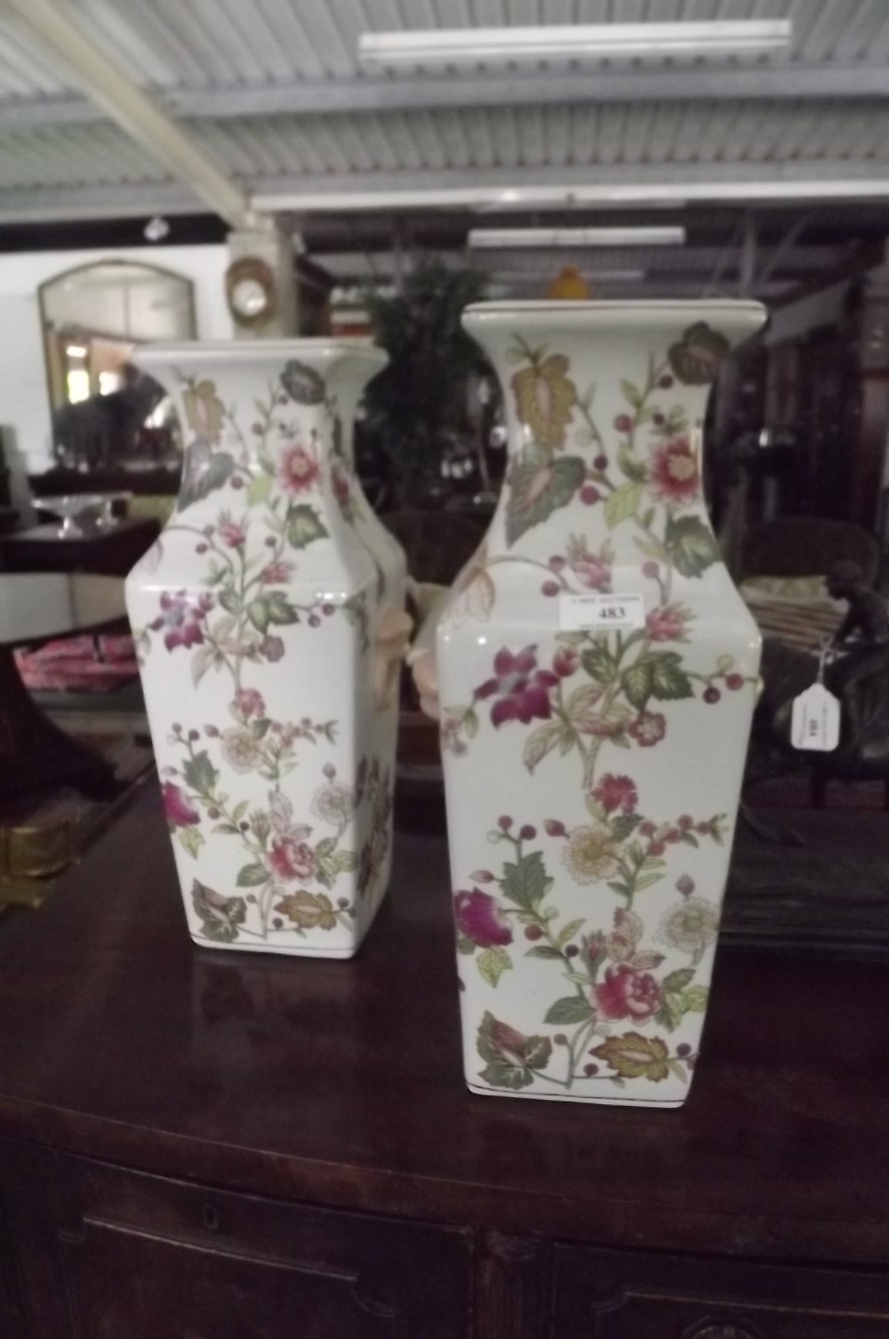 Pair of ceramic vases with floral patter