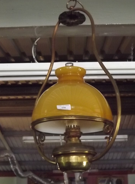 Victorian brass hanging lamp with ocre s