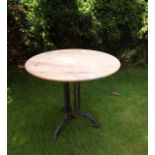 Cast iron garden table with circular mar