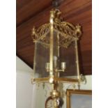 Decorative brass hall lantern with four