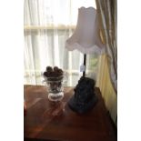 Bronzed table lamp and a moulded glass v