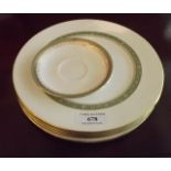 Five Royal Doulton gilt edged plates.