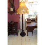 Edwardian mahogany standard lamp. {  175