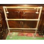 Victorian brass heated towel rail. {  93