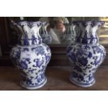 Pair of blue and white vases. {  26 cm H