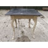 Cast iron garden table with square grani