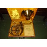 Cased brass French Horn by Parrot