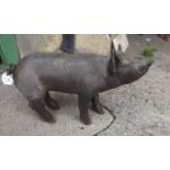 Bronze model of a pig.