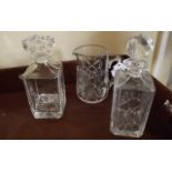 Two cut glass decanters and cut glass ju