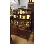 ERCOL oak dresser with two shelves and b