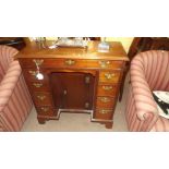 Neat George III. mahogany knee hole desk