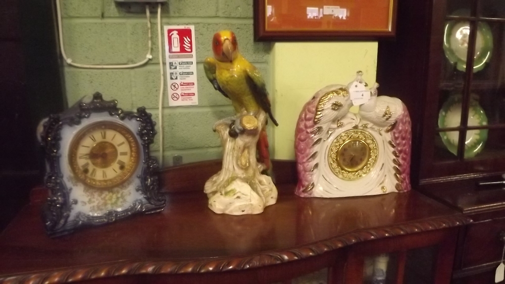 Two ceramic mantle clocks and a ceramic