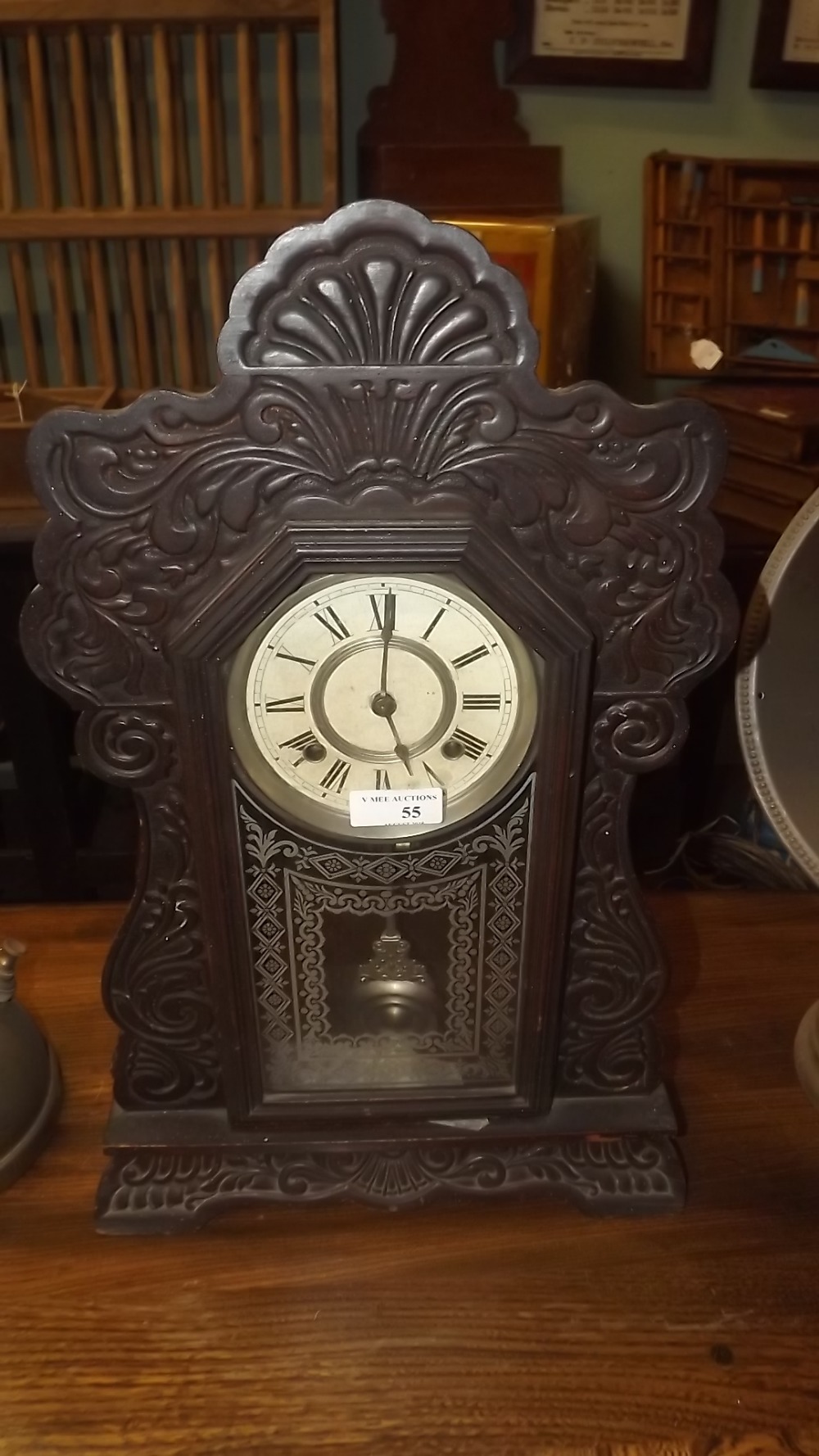 19th. C. ginger bread mantle clock.